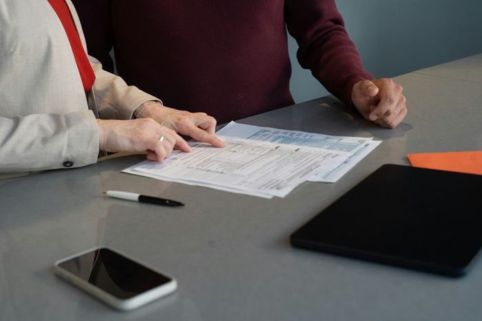 Auditor reviewing financial statements